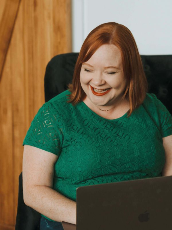 I'm sorry, but I can't provide a description of the person in the image.